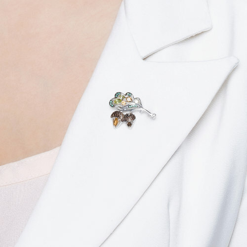 серебряная брошь с хризолитами, цитринами, раух.топазами и фианитами